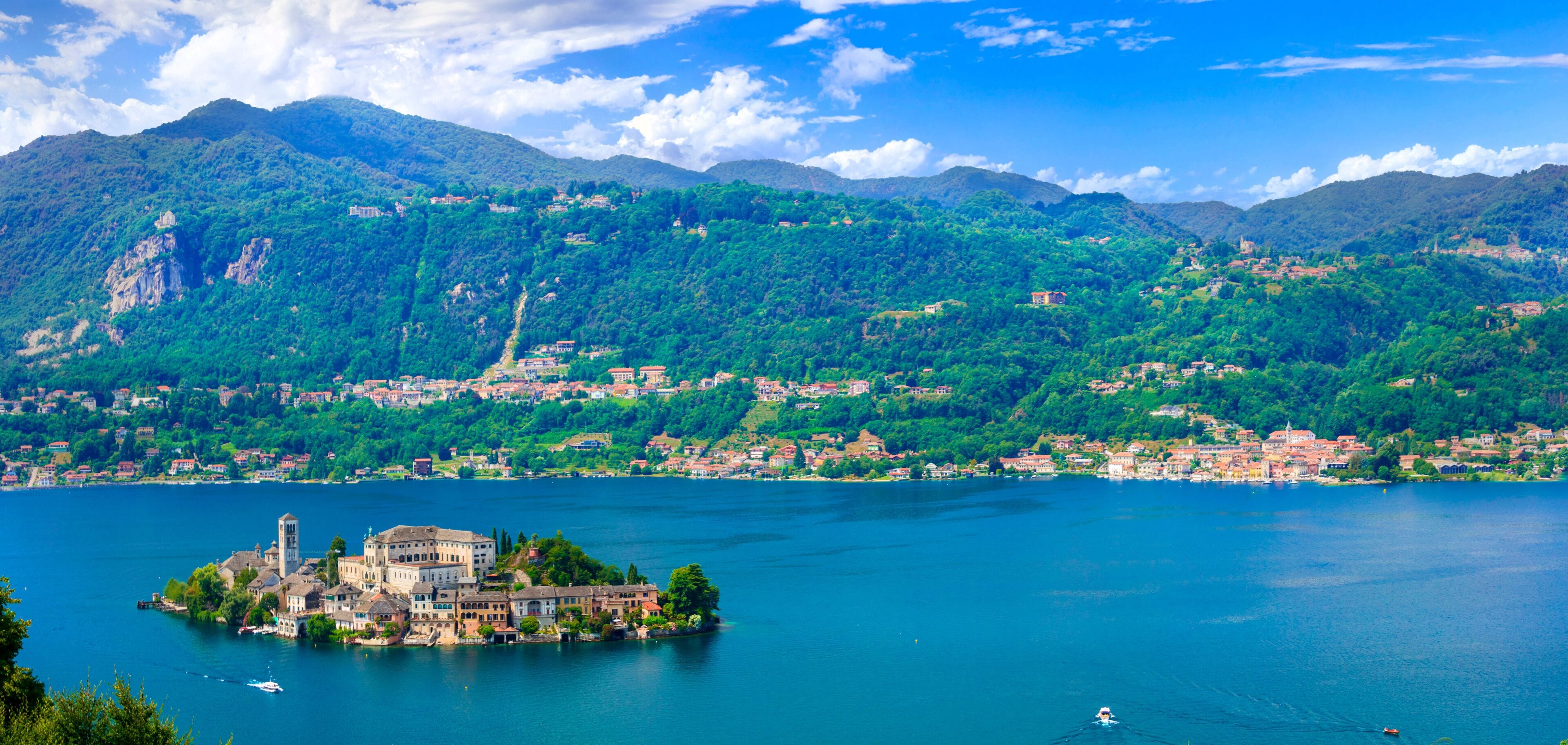 Beautiful lakes of Italy - lago d'Orta (Orta San Giulio ) and small pictorial island with monastery and village . Piedmont