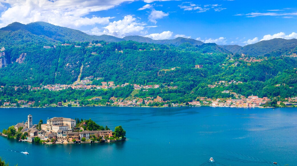Beautiful lakes of Italy - lago d'Orta (Orta San Giulio ) and small pictorial island with monastery and village . Piedmont