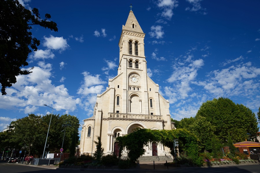 Main facade of the Notre-Dame-du-Rosaire Church, in Saint-Ouen, France .