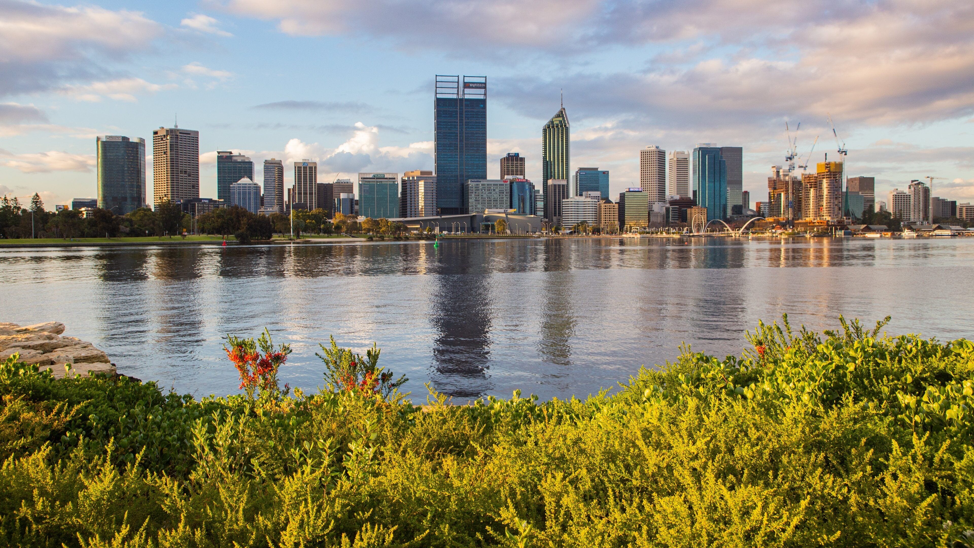 South Perth which includes a sunset, a bay or harbor and a city