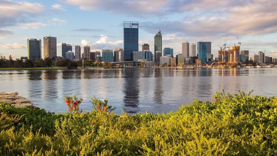 South Perth which includes a sunset, a bay or harbor and a city