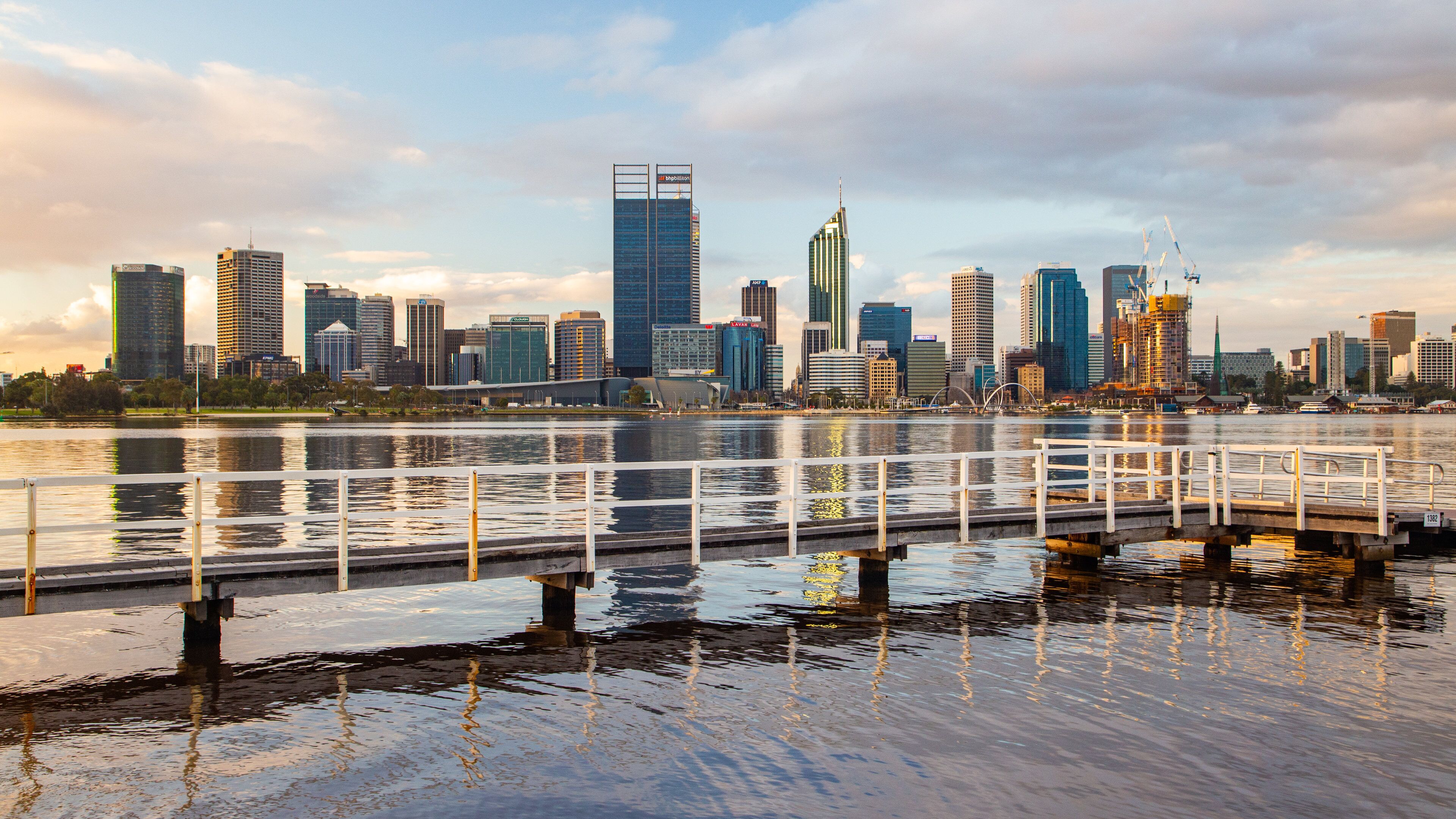 South Perth featuring a sunset, a city and a bay or harbor