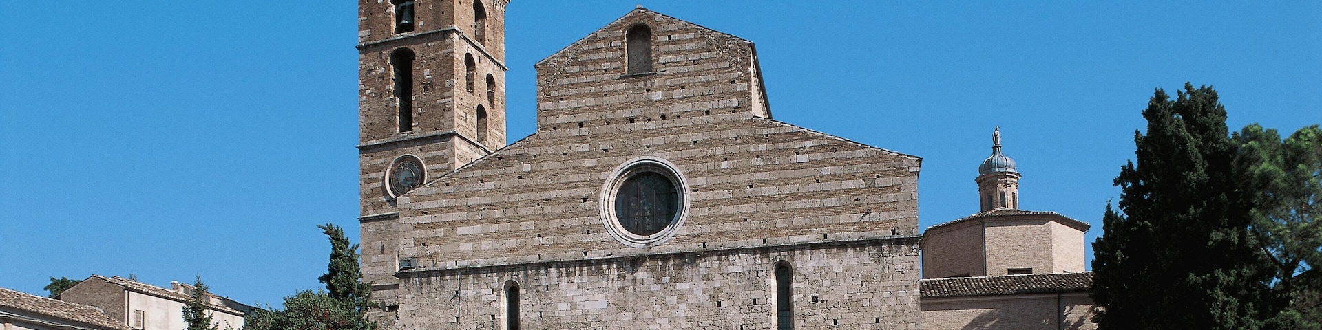 A historic church with a bell tower and a dome.