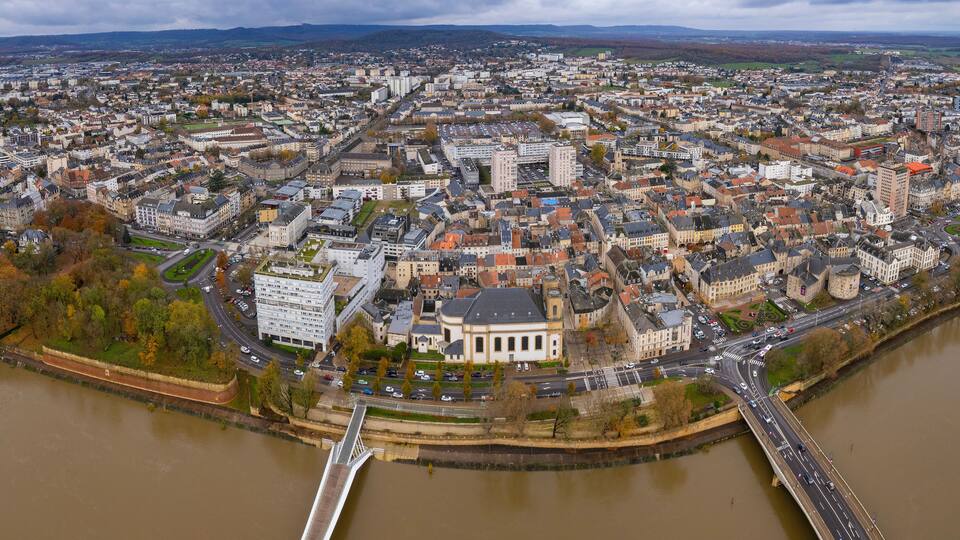 An aerial panorama view around the downtown of the City Thionville In France on a cloudy spring noon
