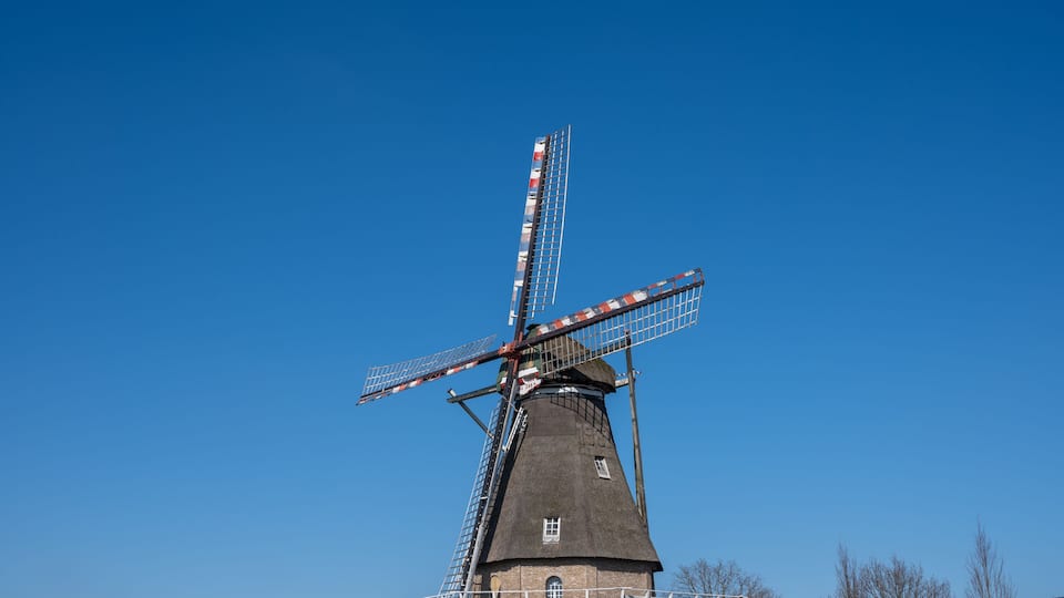 Old Dutch grain wind mill in Veldhoven, North Brabant, Netherlands