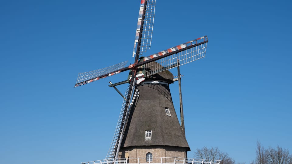 Old Dutch grain wind mill in Veldhoven, North Brabant, Netherlands
