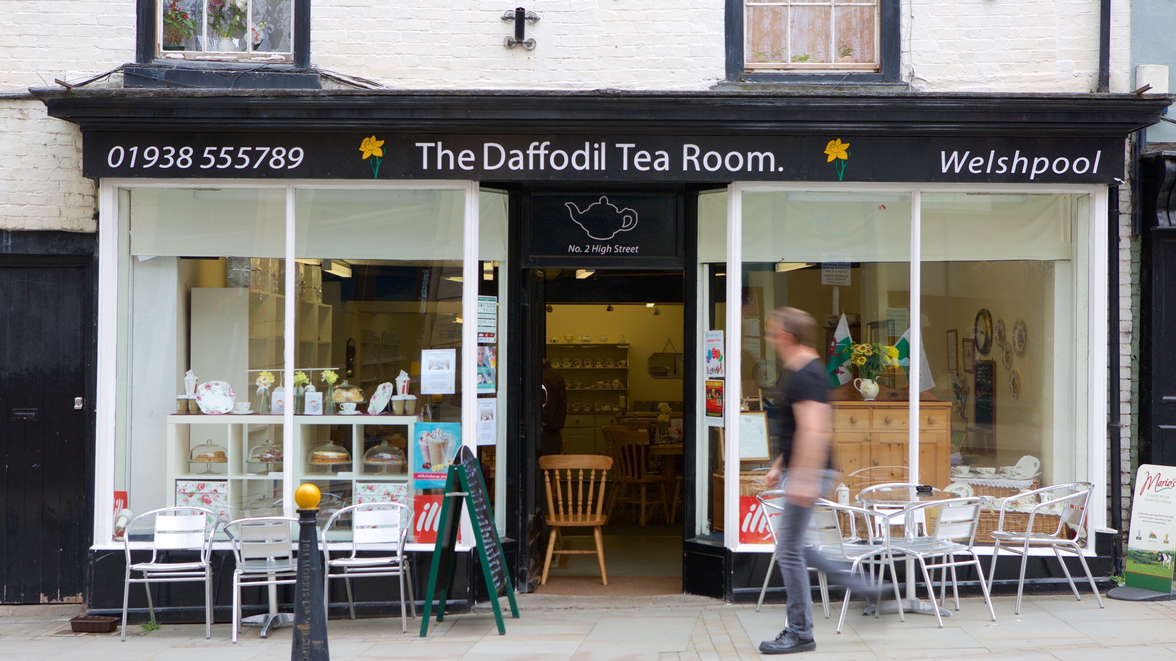 Welshpool which includes cafe scenes as well as an individual male