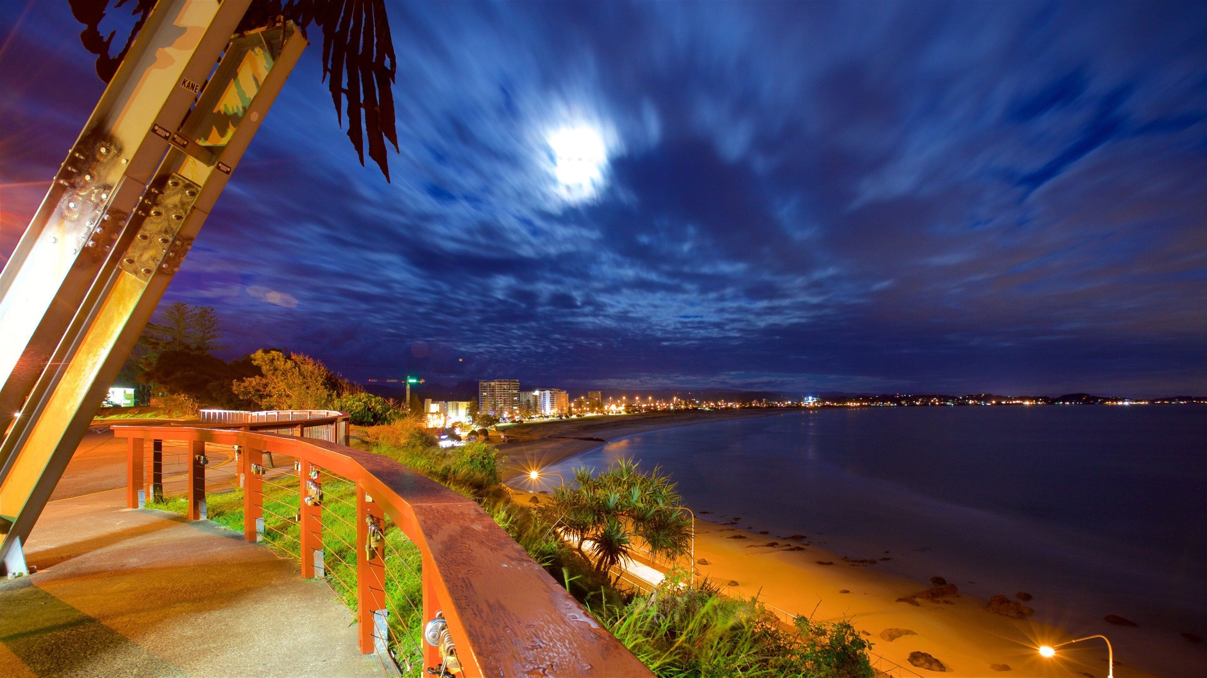 Coolangatta featuring a beach, night scenes and general coastal views
