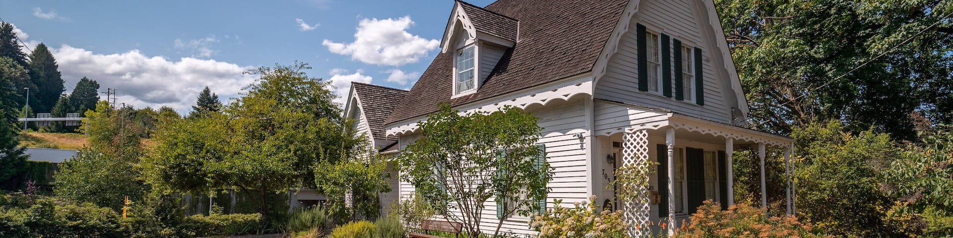 Tumwater featuring heritage elements, signage and a house