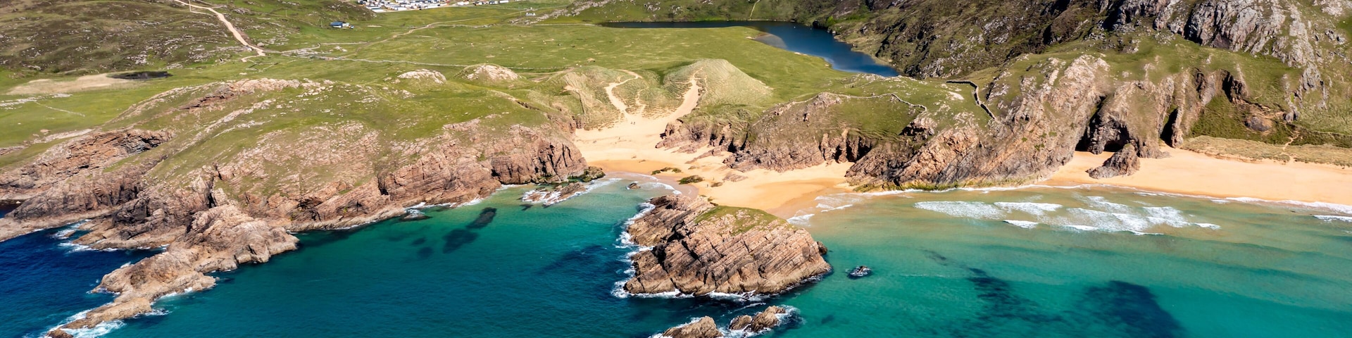 Aerial view of the Murder Hole beach, officially called Boyeeghether Bay in County Donegal, Ireland