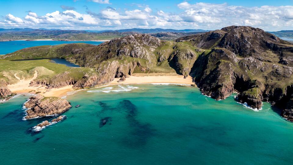 Aerial view of the Murder Hole beach, officially called Boyeeghether Bay in County Donegal, Ireland