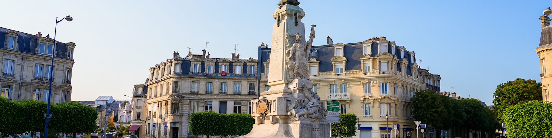 Place de la République ("Republic's Square") in Soissons, France - Roundabout with a classic sculpture celebrating freedom topped with a winged angel carrying a torch