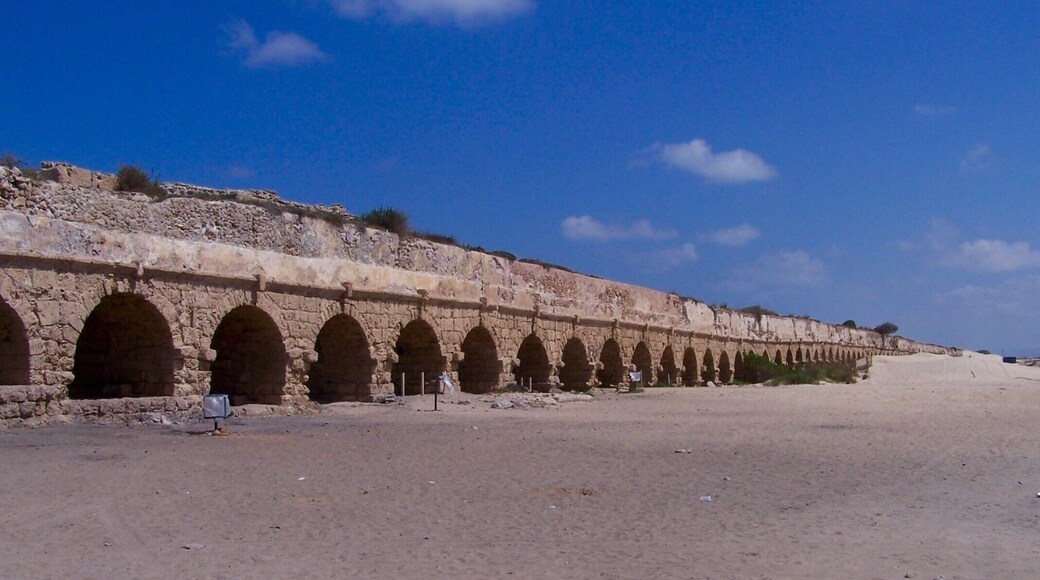 The first aqueduct was built by Herod (37BC to 4BC), at the time the new city was founded and dedicated to Caesar, Augustus. It brought the water from the southern side of Mount Carmel. The water flowed on a single raised canal, and in one section it is dug into the rock.