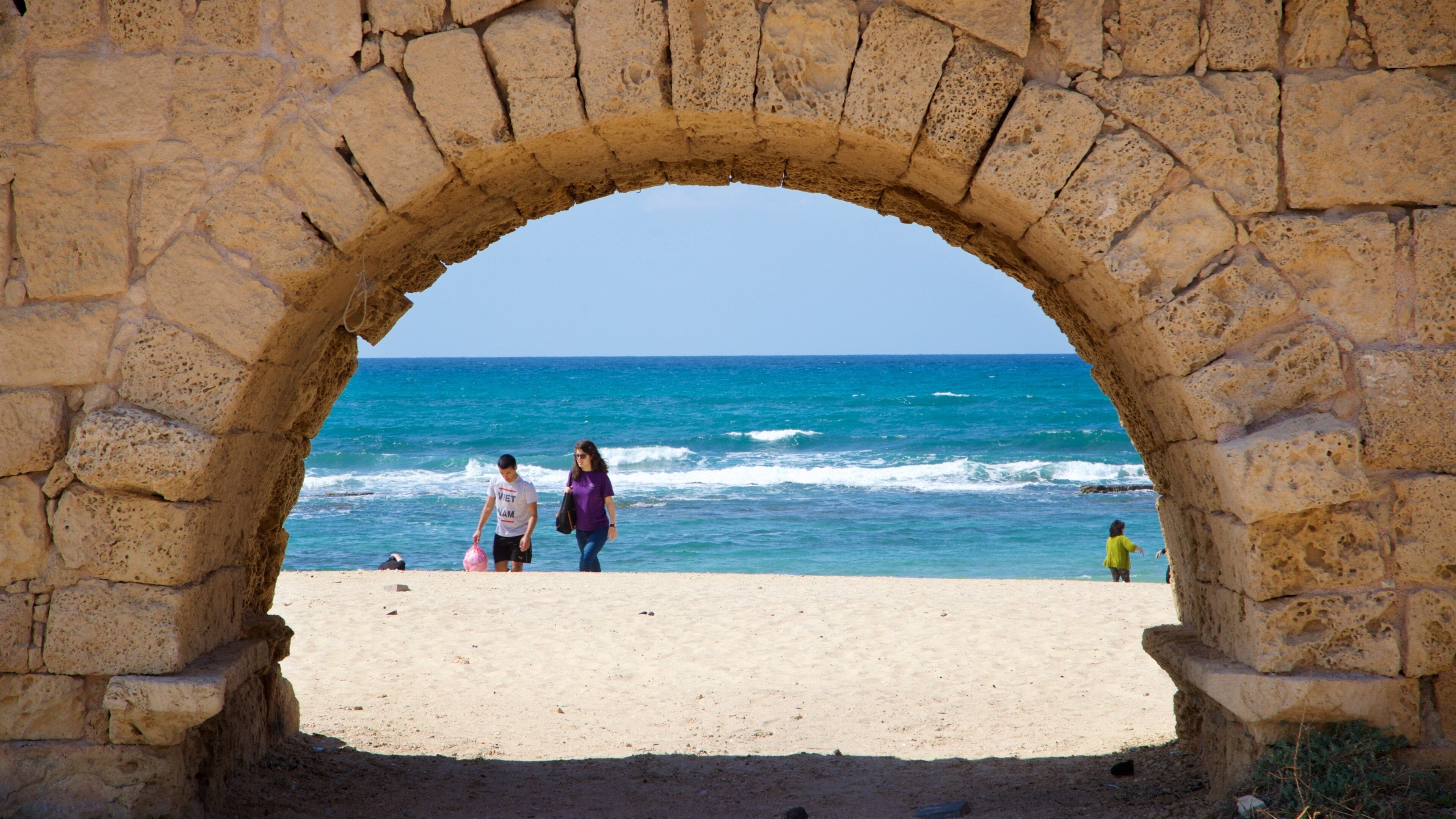 St Maarten and St Martin featuring a beach and general coastal views as well as a couple