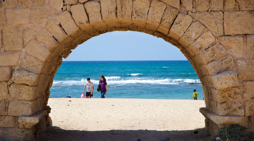 St Maarten and St Martin featuring a beach and general coastal views as well as a couple