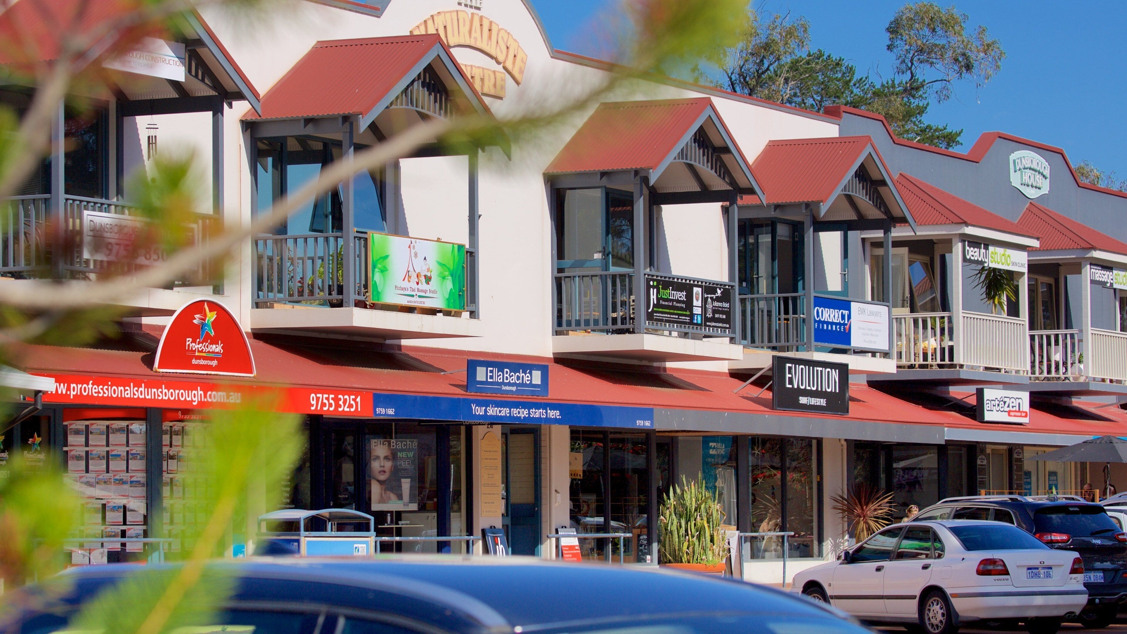 Dunsborough showing signage and a small town or village
