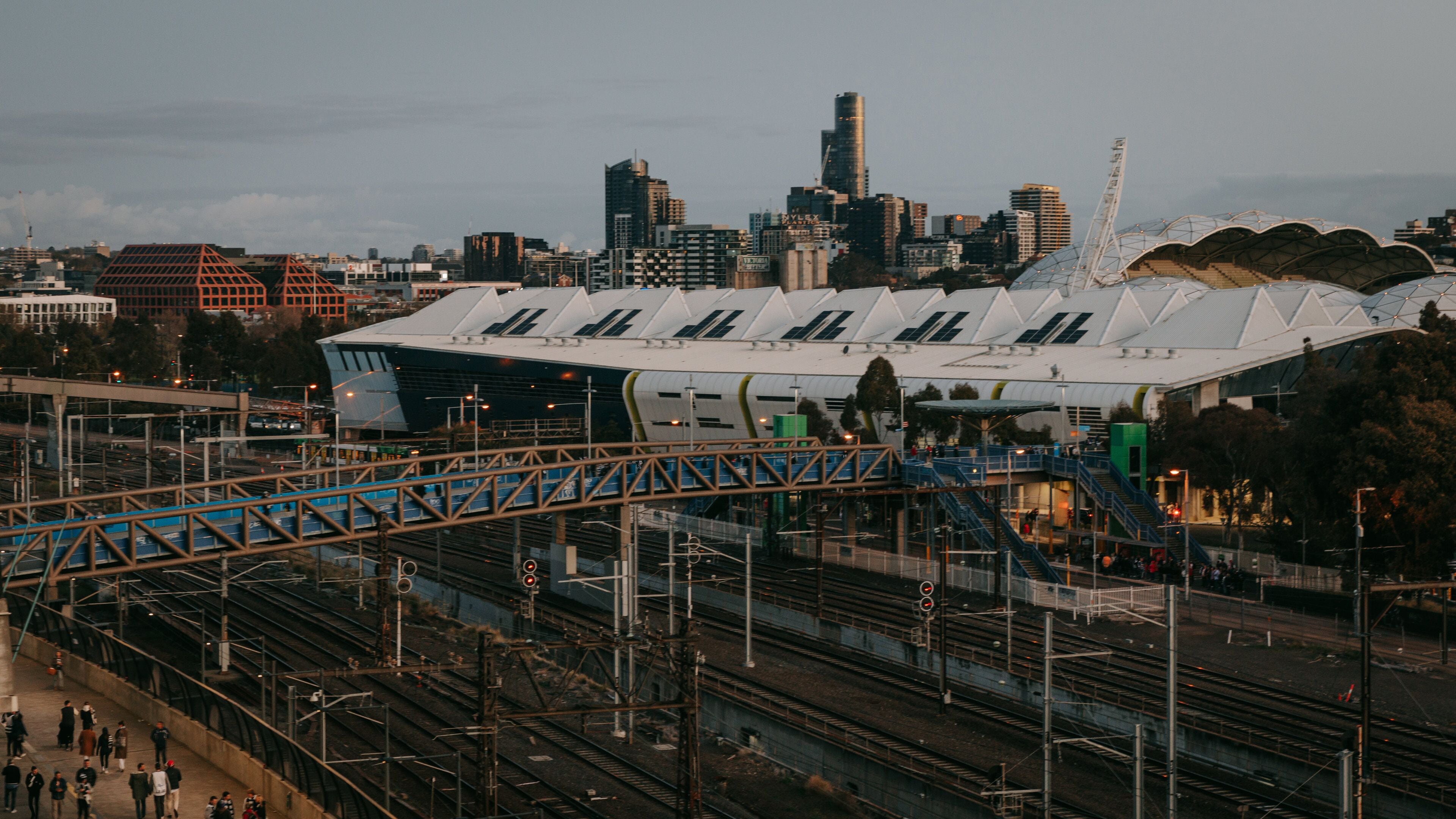 East Melbourne showing a city and night scenes