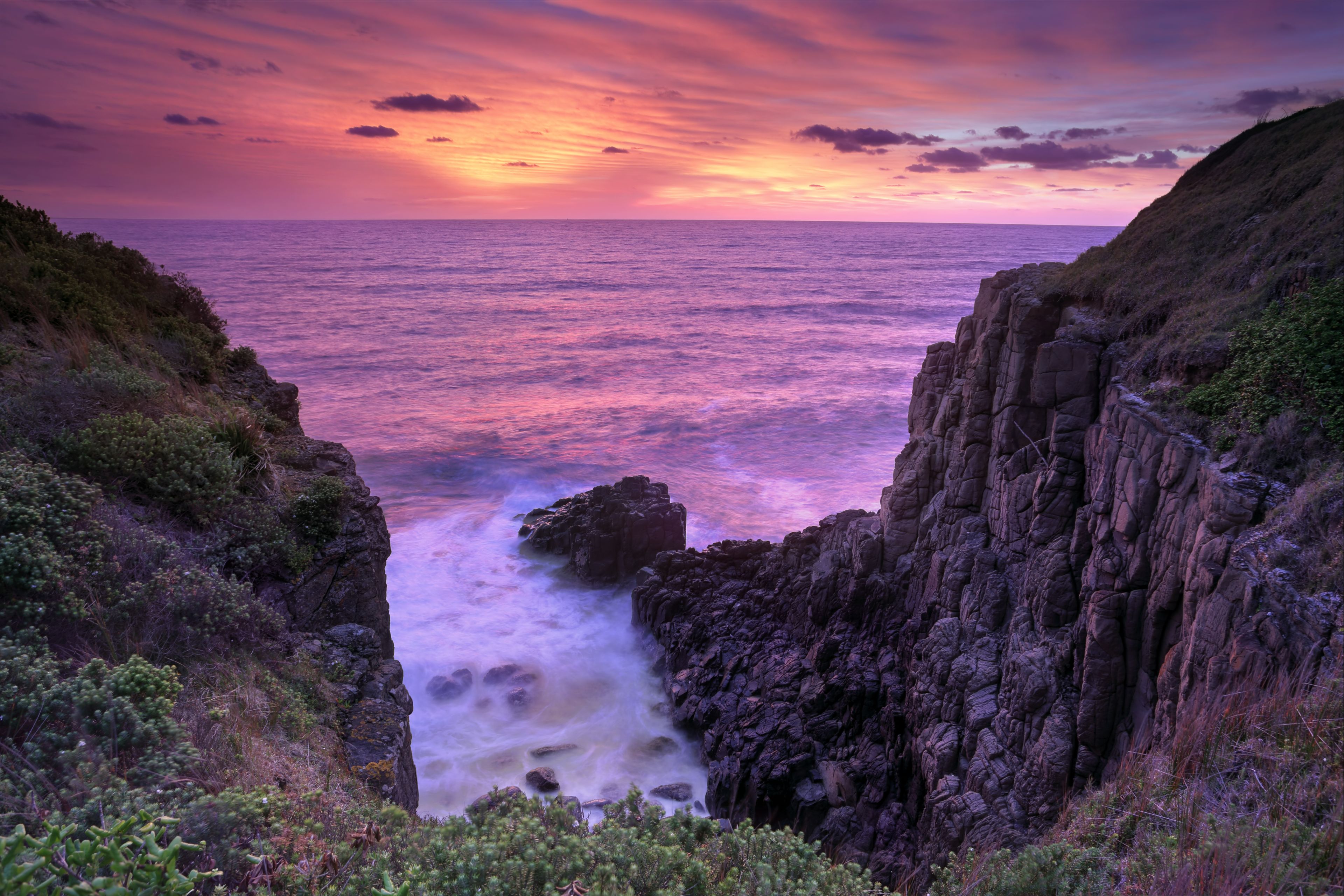 Fiery sunrise skies at Minamurra Headland South Coast Australia