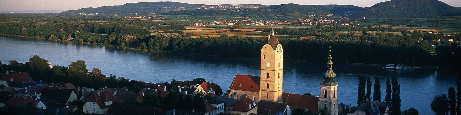 Krems an der Donau featuring a river or creek, landscape views and a sunset