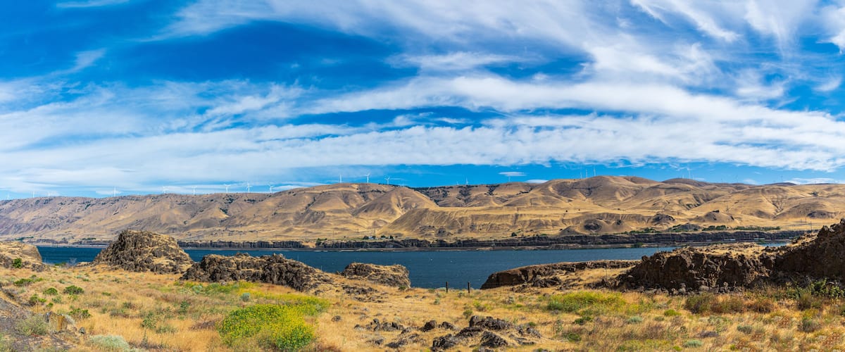 Panorama of the Arid Goodnoe Hills of Washington State, USA, Across a Windy Columbia River near Arlington, Oregon, USA