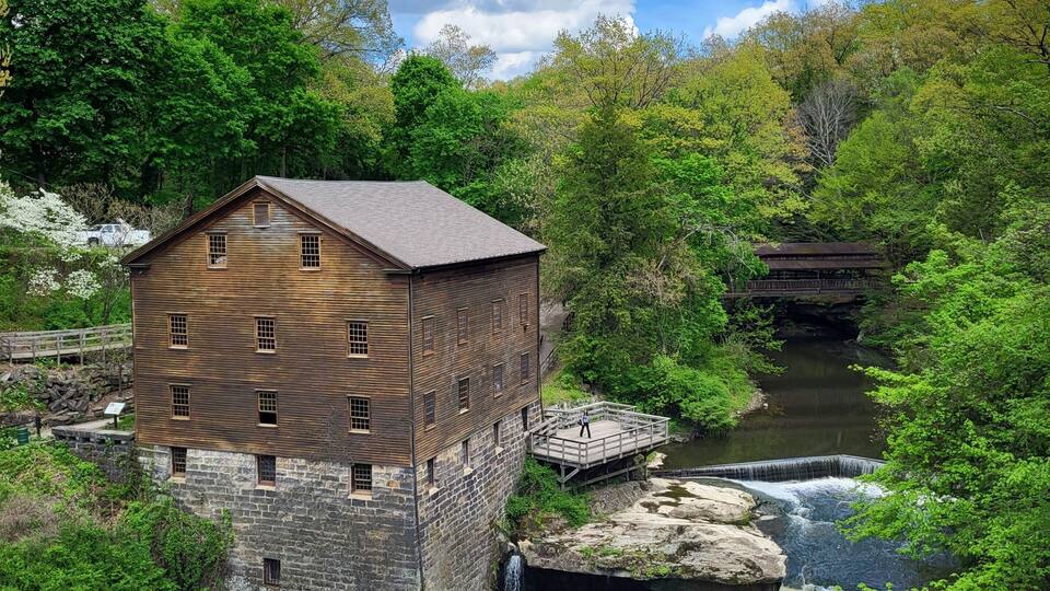 Lanterman's Mill at Mill Creek Park in Ohio with clouds