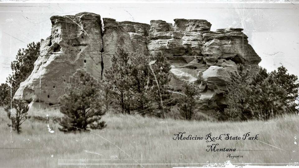 Medicine Rock State Park in Montana with prominent rock formations and sparse vegetation.