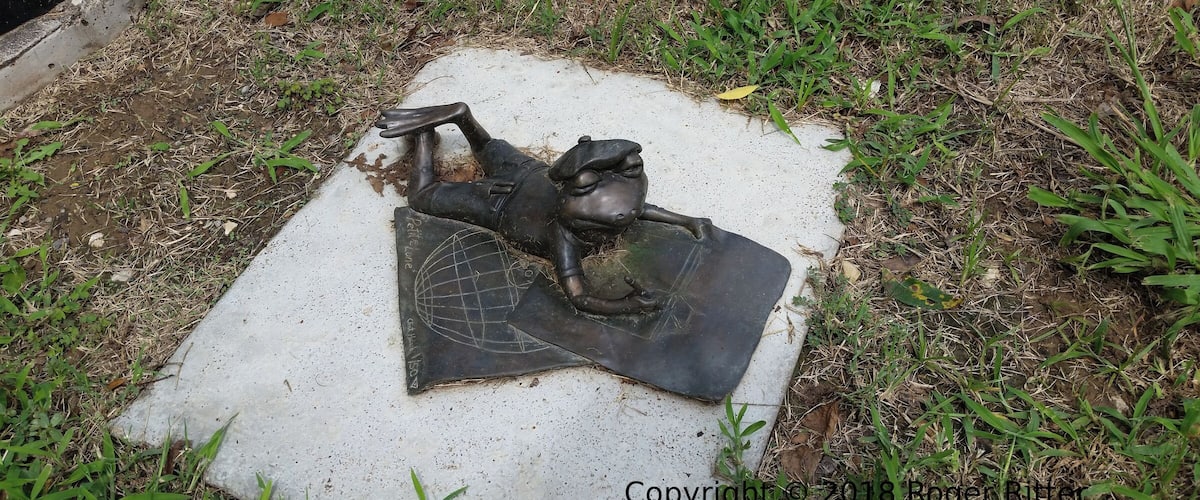 A small frog statue that's part of the public art program in Bastrop, Texas