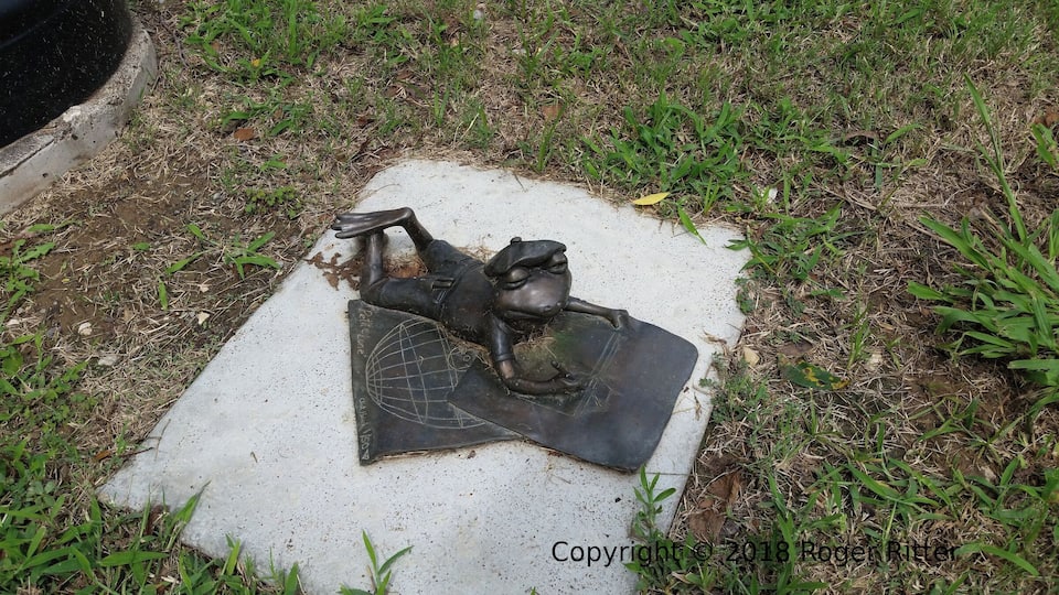 A small frog statue that's part of the public art program in Bastrop, Texas