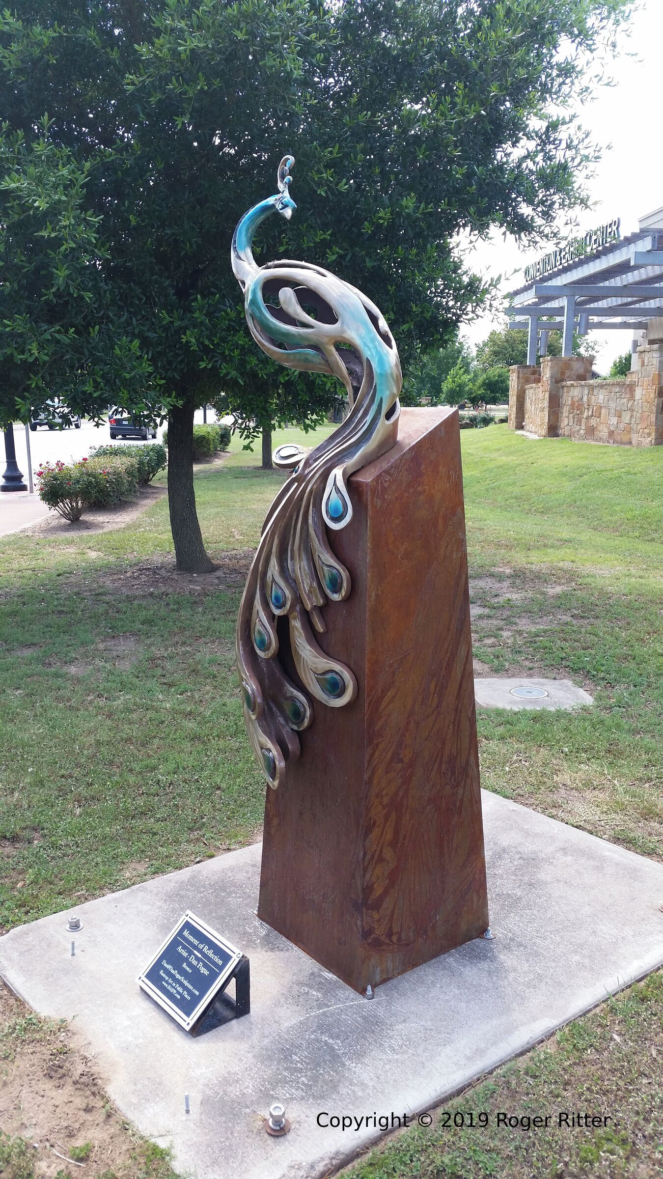 Peacock sculpture by Dan Pogue - "Moment of Reflection". Placed by Bastrop Art in Public Places