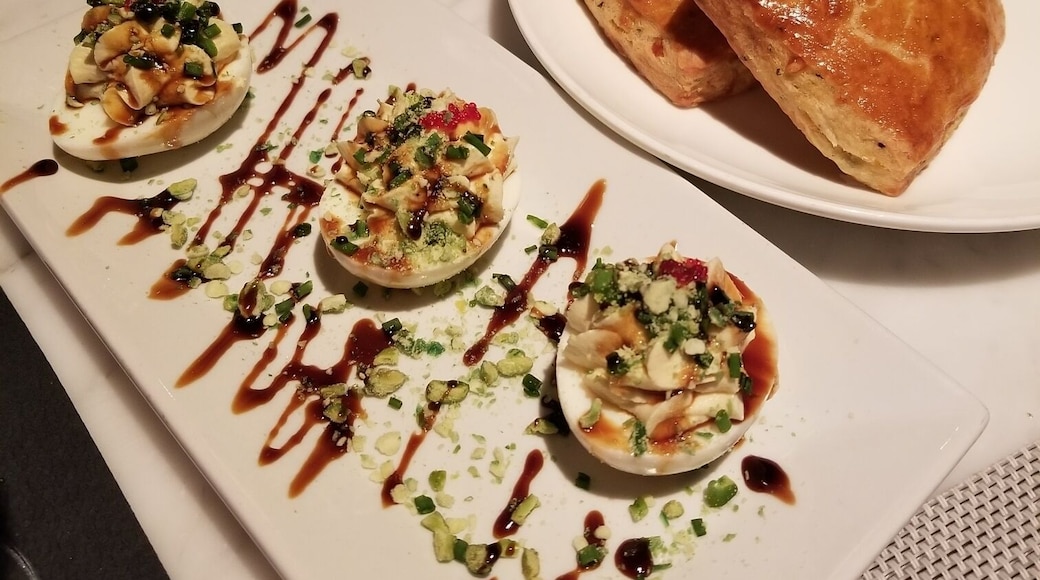 Spiced deviled eggs with wasabi peas and tarragon biscuits for a great start.