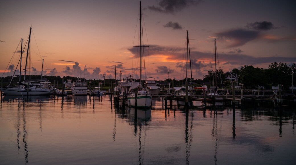 Sailboats at a marina at dawn in Beaufort North Carolina.