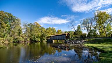 Fallasburg Covered Bridge over the Flat River in Fallasburg Village County Park in Lowell, MI
