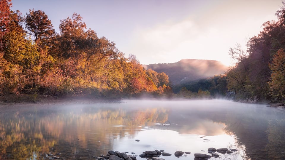 Panorama of Sunrise above Foggy River