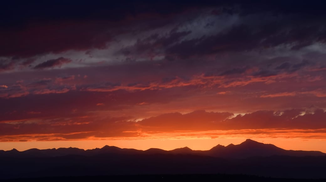 colorful Summer sunset over long's peak and the front range of the Rocky Mountains of colorado, as seen from Broomfield, colorado