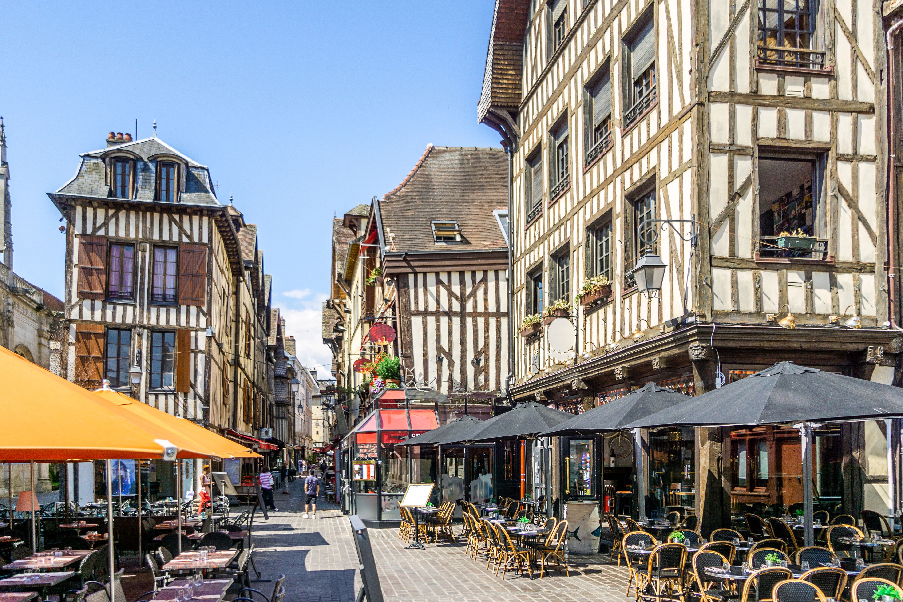 Half timbered medieval houses at market square in charming Troyes, France