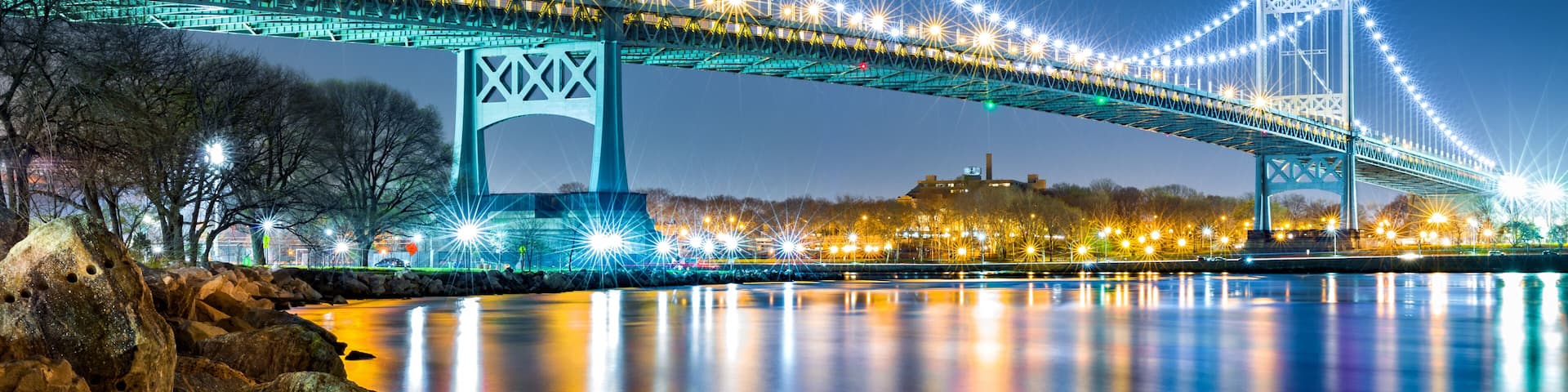 Robert F. Kennedy Bridge (aka Triboro Bridge) by night viewed from Randalls Island, New York