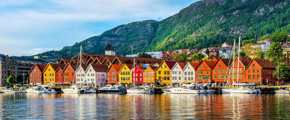 A harbor with colorful houses and boats.