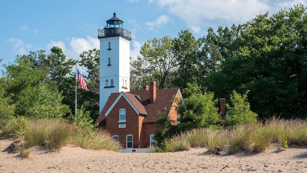 The 68 feet (21 m) tall Presque Isle Lighthouse is situated on the northern shoreline of Presque Isle State Park.
