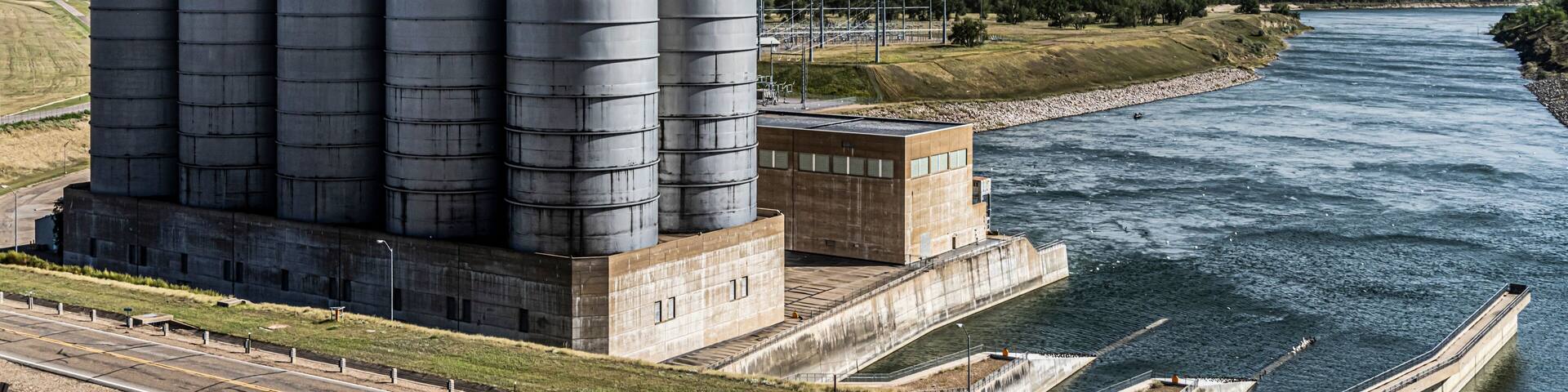 Garrison Dam Powerhouse and other assorted building, tanks around and attached to Dam in North Dakota.