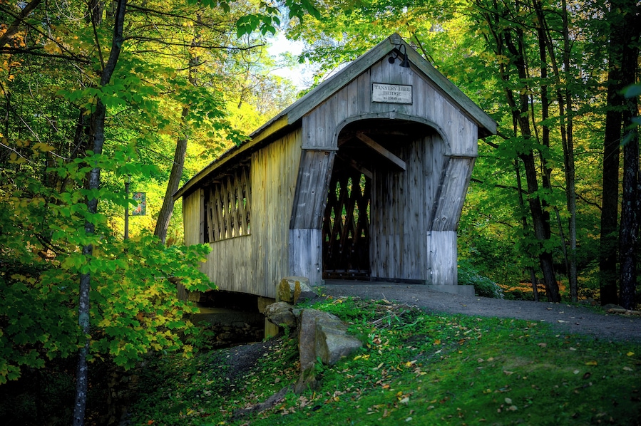 The Tannery Hill Covered Bridge spans the Gunstock Brook just north of the village proper in Gilford. The bridge was constructed by Tim Andrews and presented to the community of Gilford by the Gilford Rotary Club in 1995. It was built to link the town hall with the rest of the town center. It is named for the tannery that once stood in the area.
#LocalSecrets #MyBackyard #Trovember