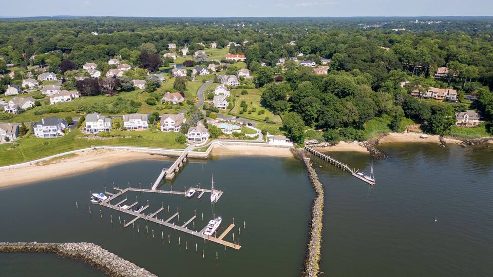 Glen Cove NY Waterfront Real Estate Sought After Beach Community Drone Photos Luxury Homes Coastal Living