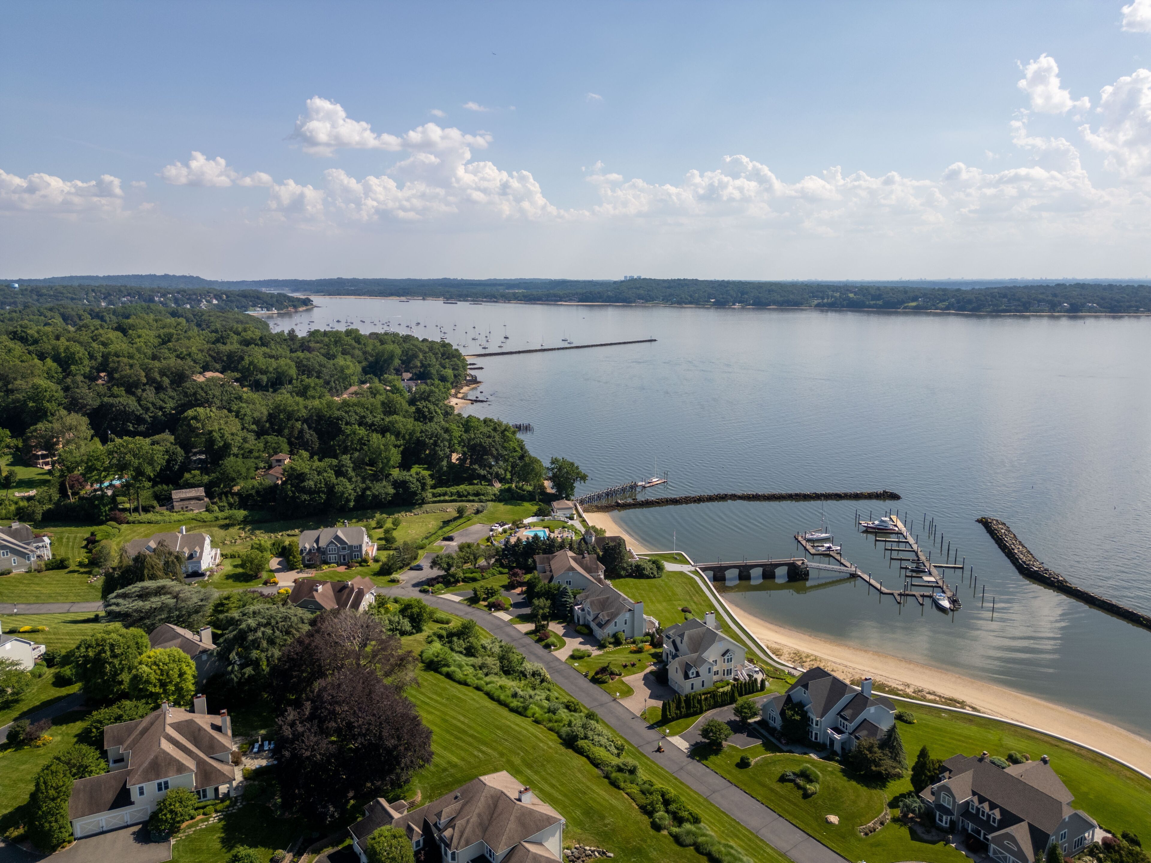 Glen Cove NY Waterfront Real Estate Sought After Beach Community Drone Photos Luxury Homes Coastal Living