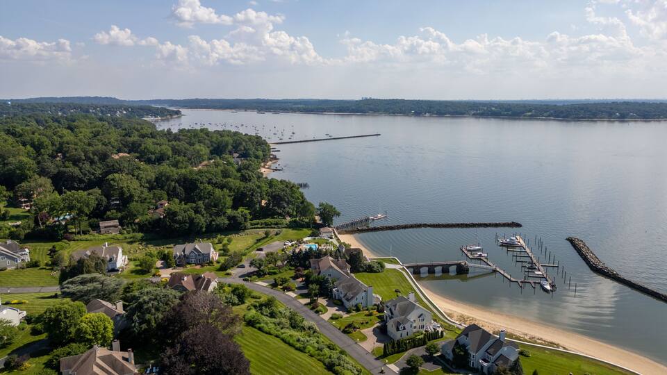 Glen Cove NY Waterfront Real Estate Sought After Beach Community Drone Photos Luxury Homes Coastal Living
