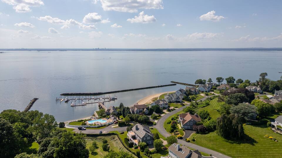 Glen Cove NY Waterfront Real Estate Sought After Beach Community Drone Photos Luxury Homes Coastal Living