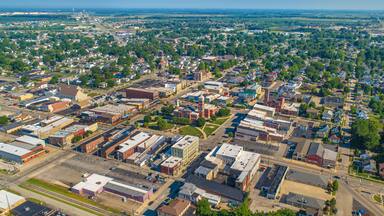 Aerial View of Greensburg Indiana Downtown Courthouse Tower Tree