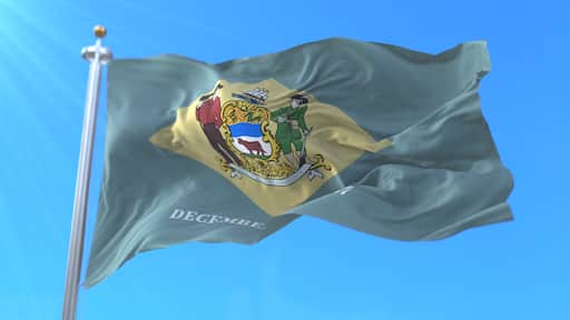 Flag of american state of Delaware, region of the United States, waving at wind