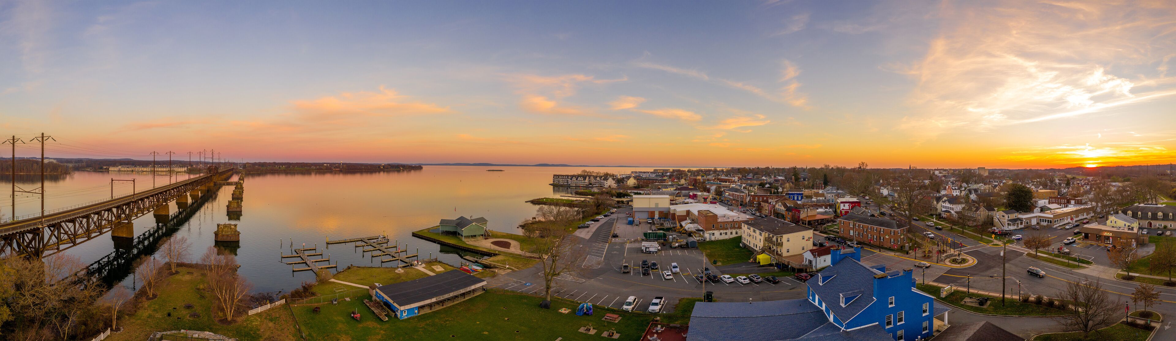 Aerial sunset panorama of Havre de Grace Maryland with orange sky and clouds reflecting on the Susquehanna River and the  Chesapeake Bay one of the best small towns in America