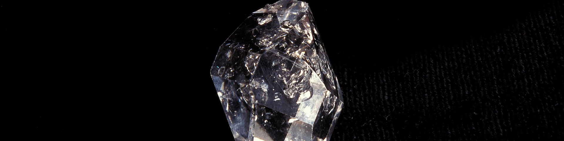 HERKIMER DIAMOND AGAINST BLACK BACKGROUND