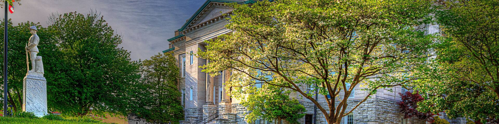 Soldier Standing Guard at the Courthouse. A monument to the soldiers that fought in the First World War stands quietly at parade rest.