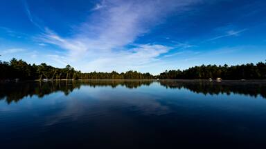Reflections on Tee Lake in Lewiston Michigan